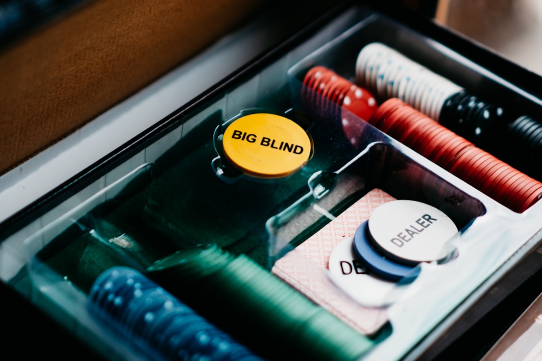 Poker chips and accessories inside a case.